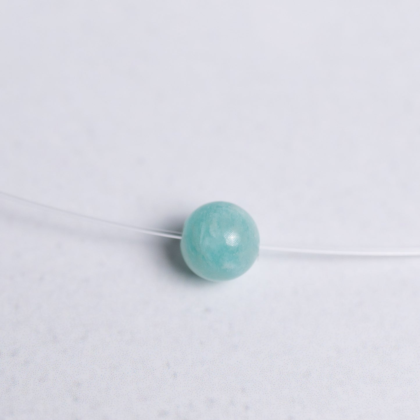 Kette mit 6mm Edelstein-Perle nach Wahl – transparentes Nylonband – handgefertigter Schmuck von Moonlight Edelsteine