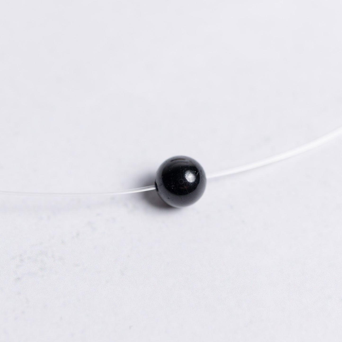 Kette mit 6mm Edelstein-Perle nach Wahl – transparentes Nylonband – handgefertigter Schmuck von Moonlight Edelsteine