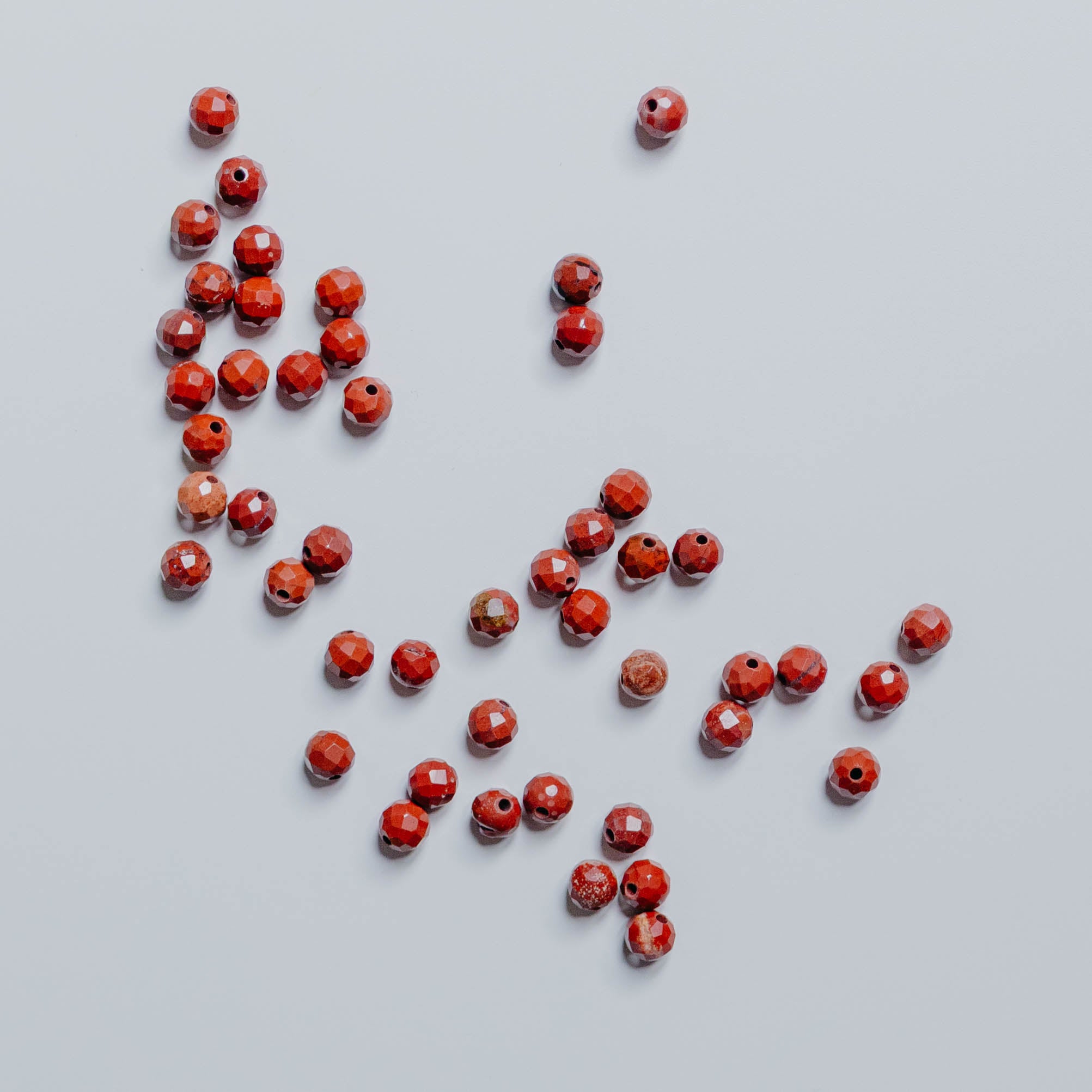 Roter Jaspis - Perle - 4mm - facettet