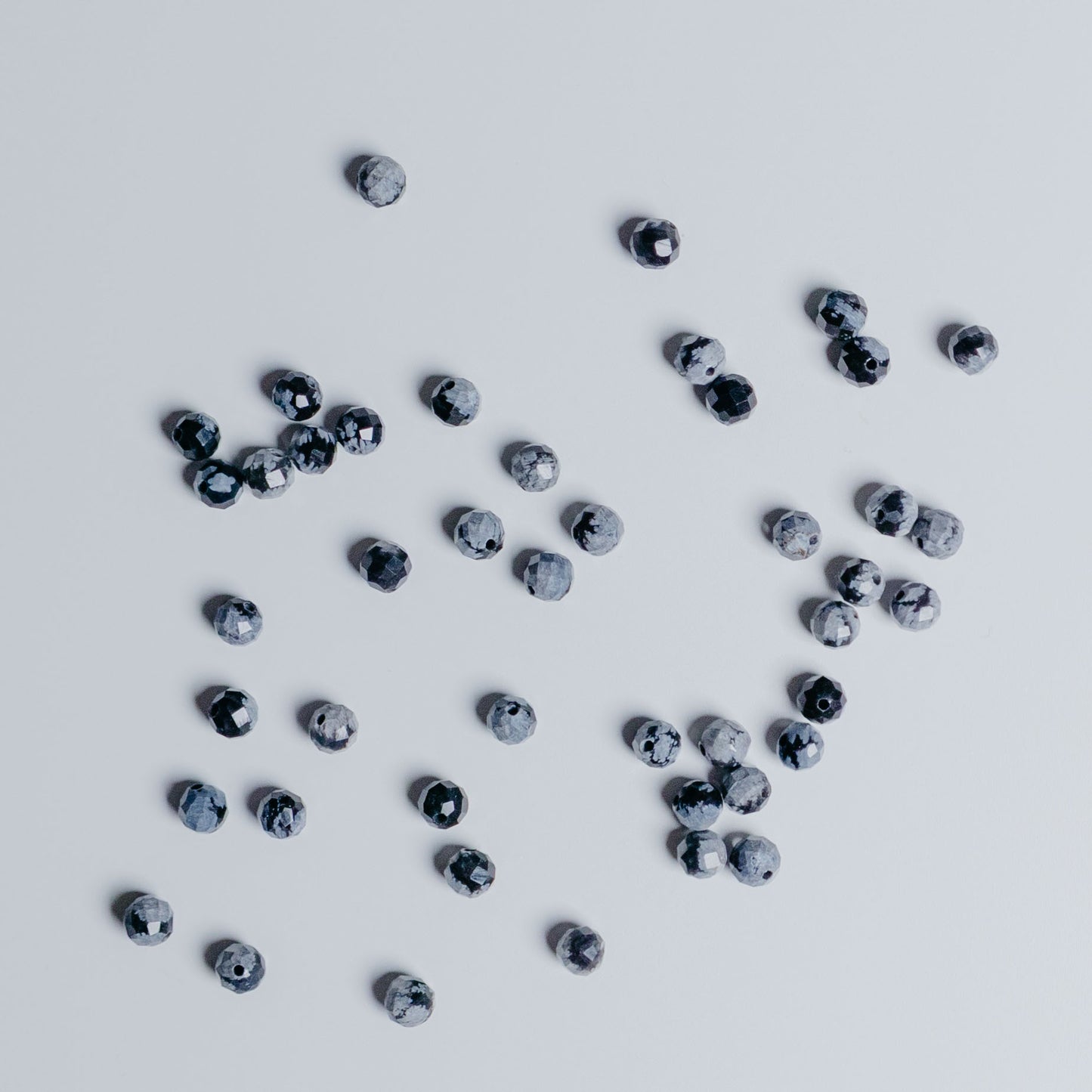 Schneeflockenobsidian - Perle - 4mm - facettet